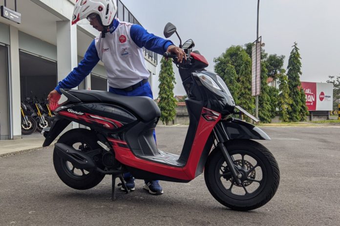 naik motor cek